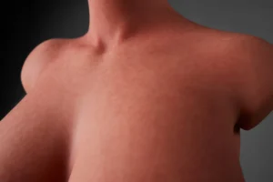 ULW 883# Fiora: This close-up highlights the neck and delicate collarbone lines of a headless half-body torso, showcasing rounded shoulder contours and healthy-toned skin realistically detailed by dense, fine freckles and textures.