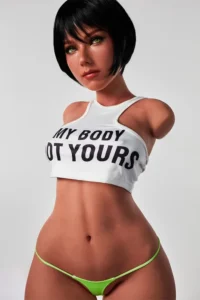 ULW 882# Livia: This main image features a half-body torso with a detailed short-haired head sculpture, wearing a white crop top and green bikini, highlighting a slender waist, voluminous hip curves, and healthy skin accented with realistic freckles.