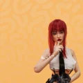 Red-haired sex doll on Ganova yellow patterned background