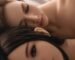 Two realistic silicone dolls resting beside each other