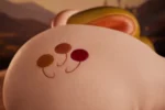 PA-Peppy: This close-up view focuses on the smooth curve of the product's hip, clearly showcasing a delicate balloon emblem composed of three reddish-yellow dots and lines on the soft, lifelike skin texture.