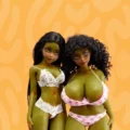 Goblin Sex Doll with two green fantasy dolls on Ganova orange patterned background