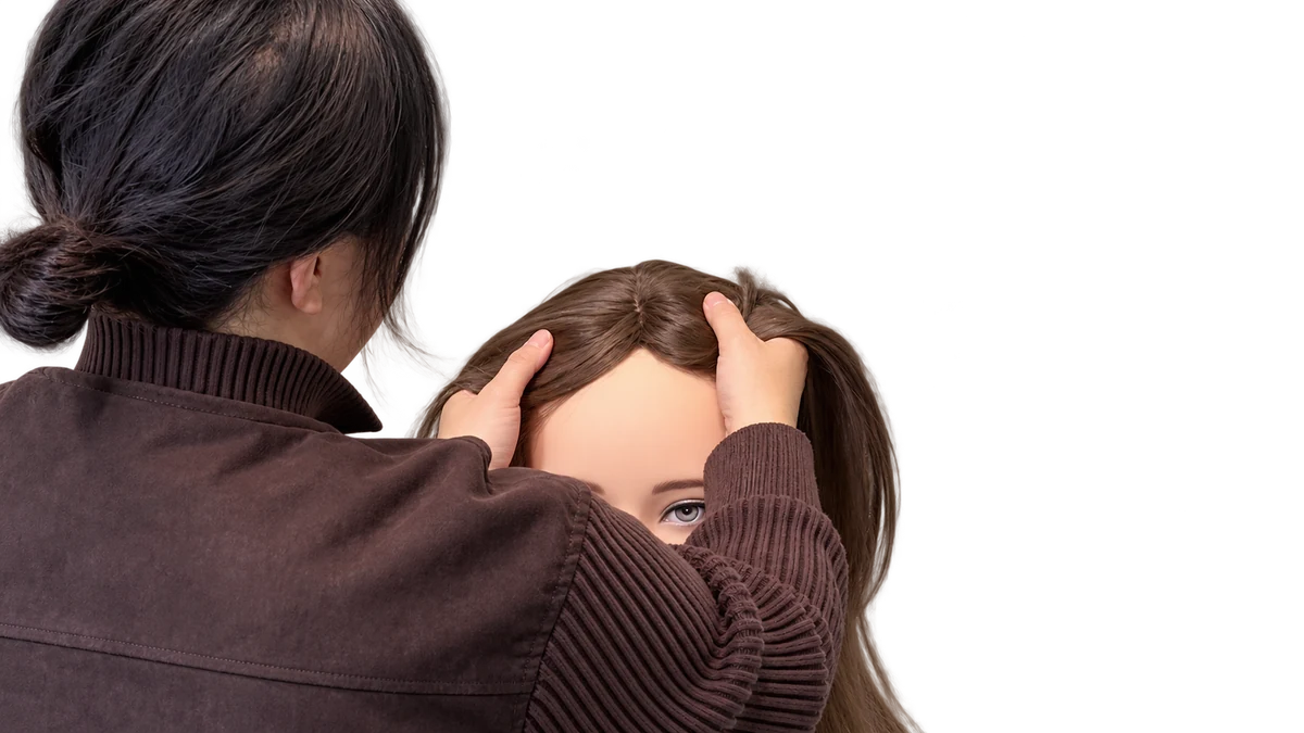 Place the wig on the head and adjust the cap